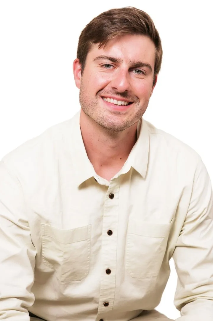 Professional headshot of T.J. van Gerven, founder of Memento Financial Planning, smiling in a cream-colored shirt against a white background.
